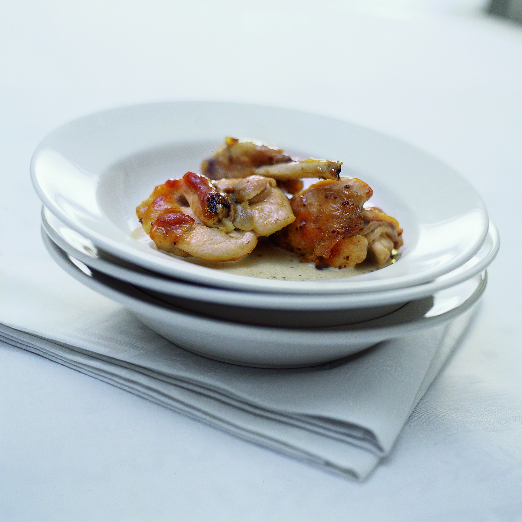 Flambiertes Kaninchenragout an Senfsauce