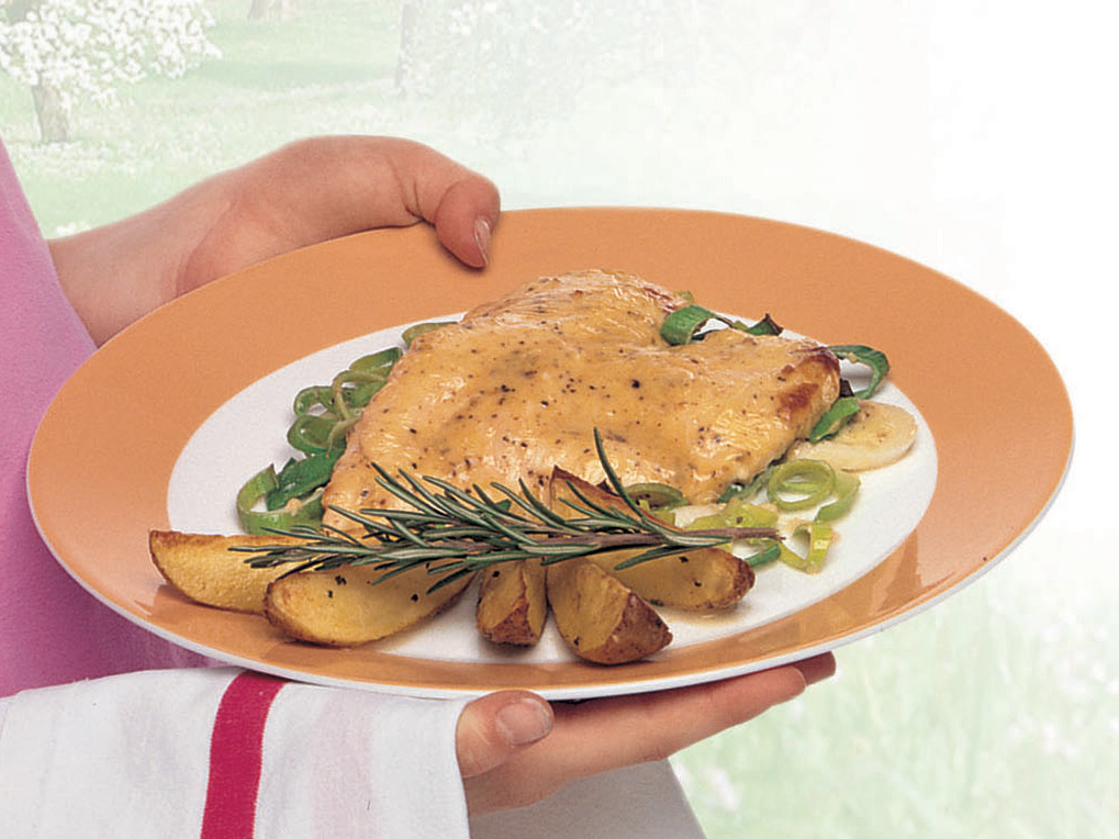 Gebackene Pouletherzen mit würzigen Kartoffelschnitzen