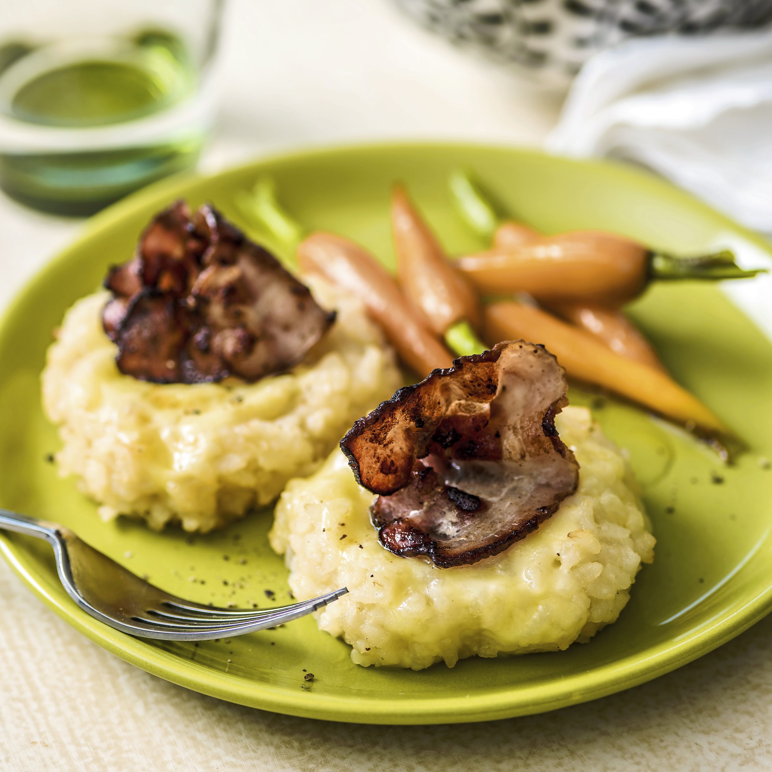Gratinierte Reistätschli mit Speck
