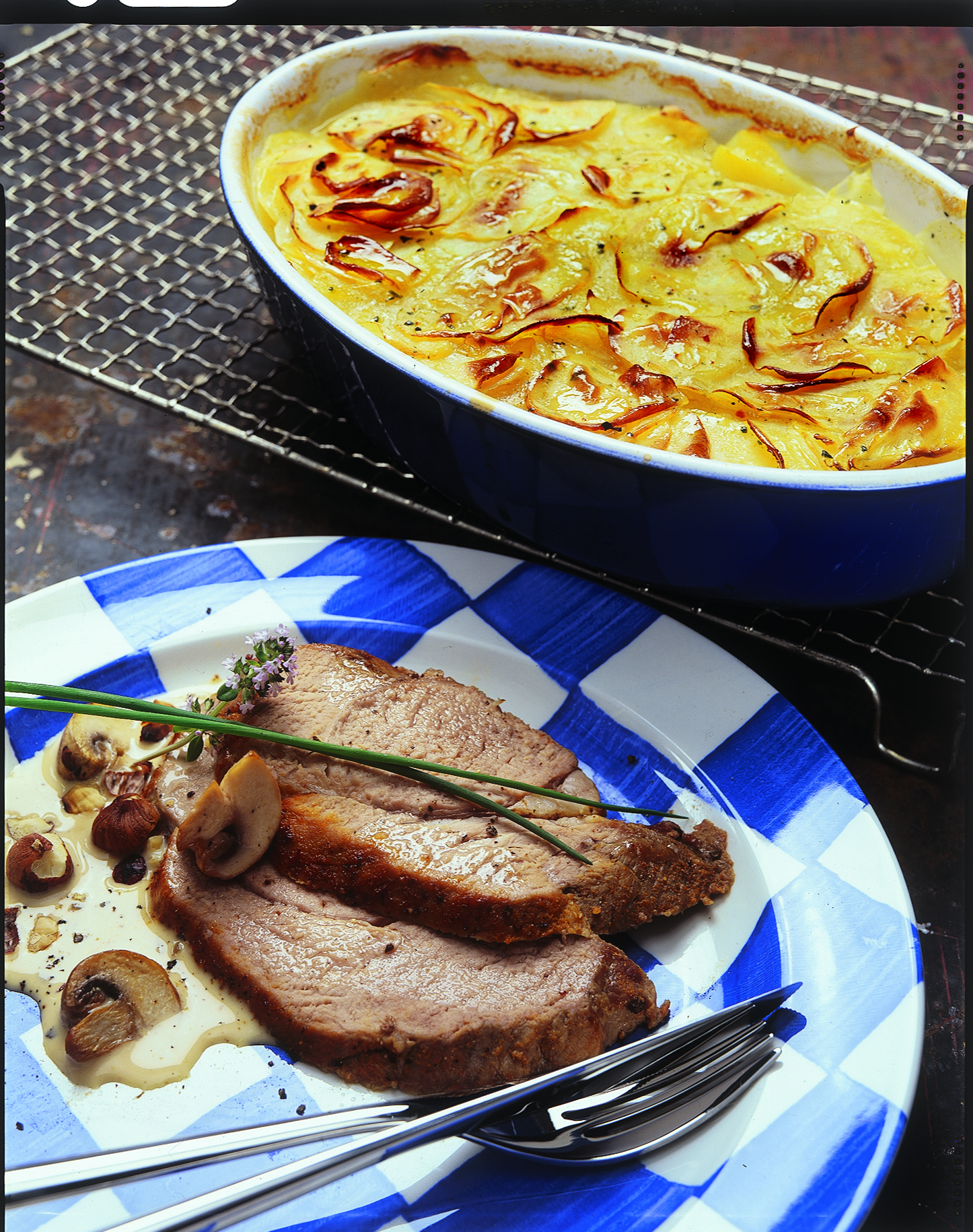 Rôti de veau sauce noisettes-champignons et gratin savoyard