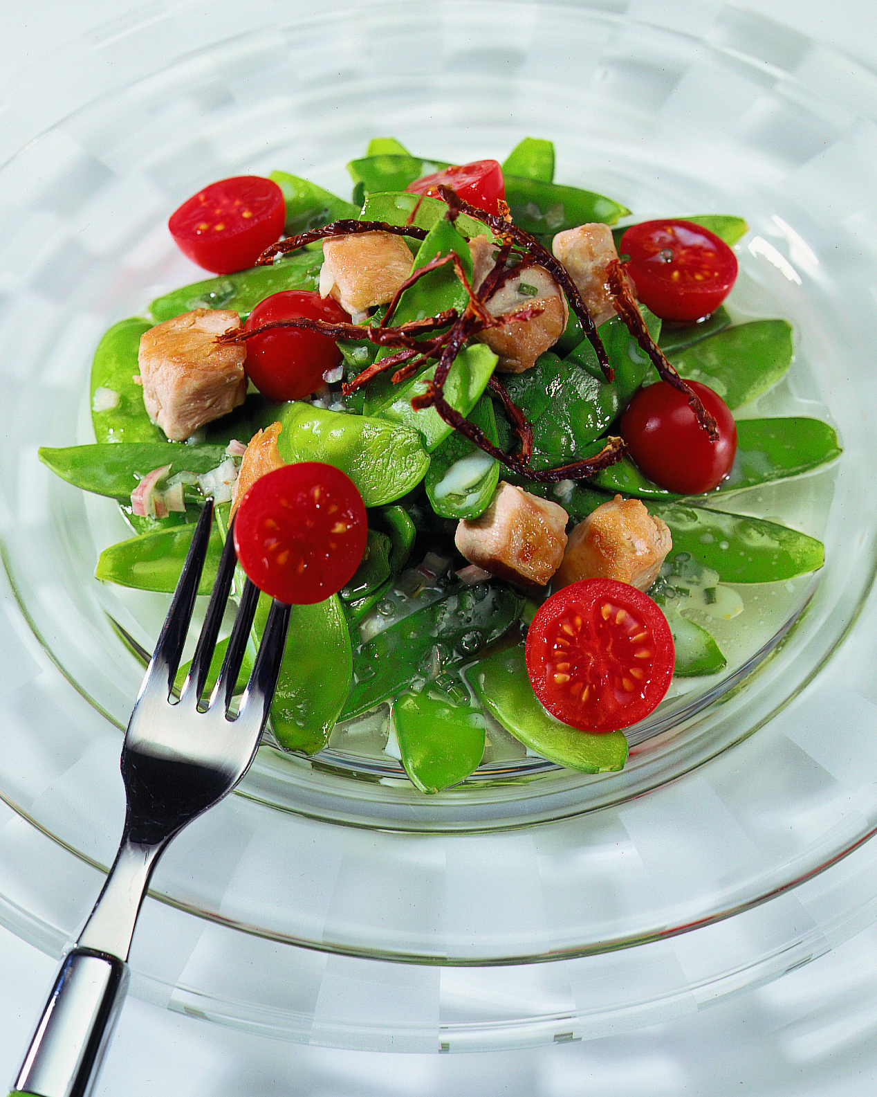 Lapin à la vinaigrette sur lit de pois mange-tout