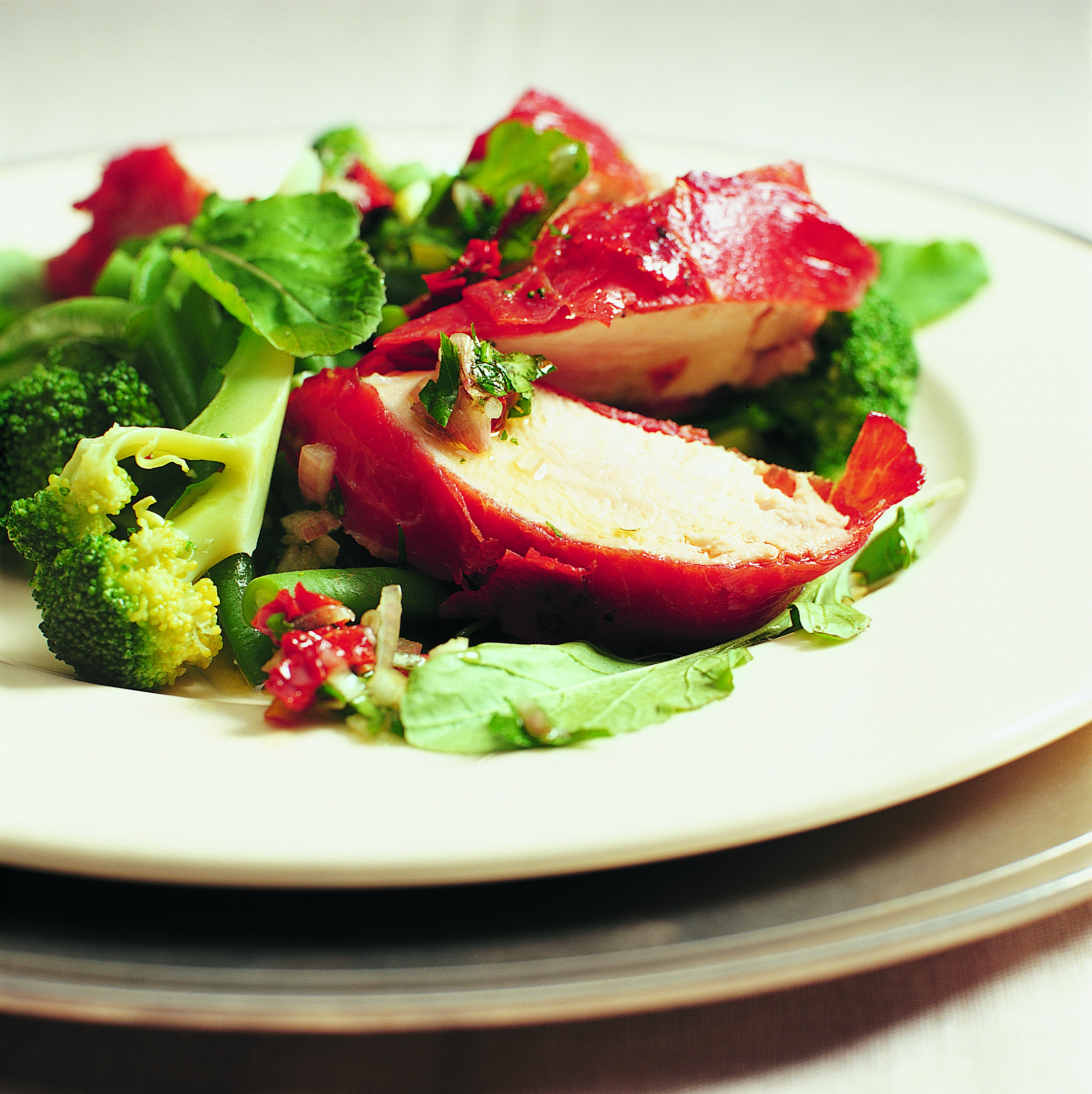 Filets de lapin et salade de légumes tiède