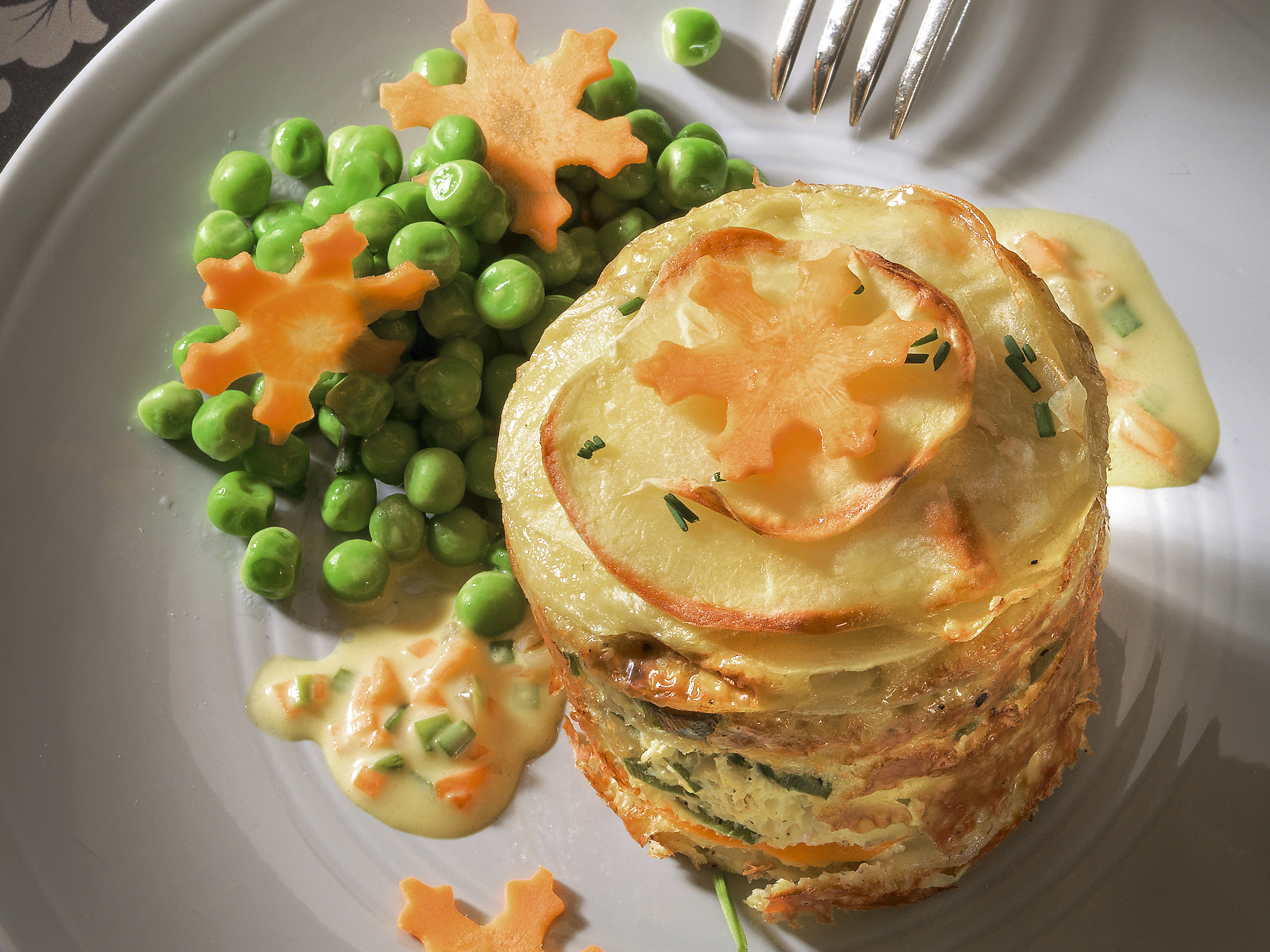 Kartoffel-Timbales mit Gemüse-Rahmsauce