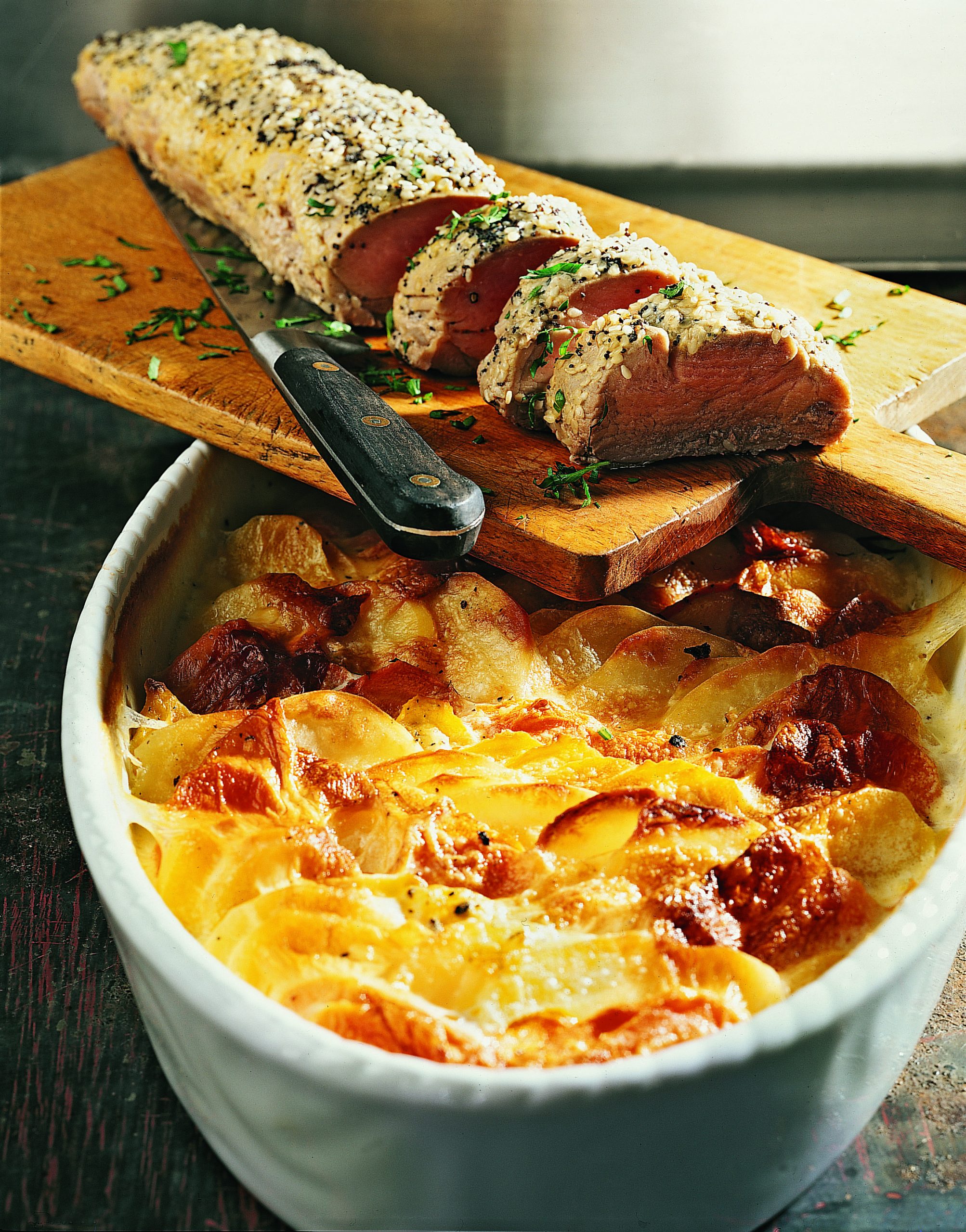 Gratin de pommes de terre aux légumes et filet de porc