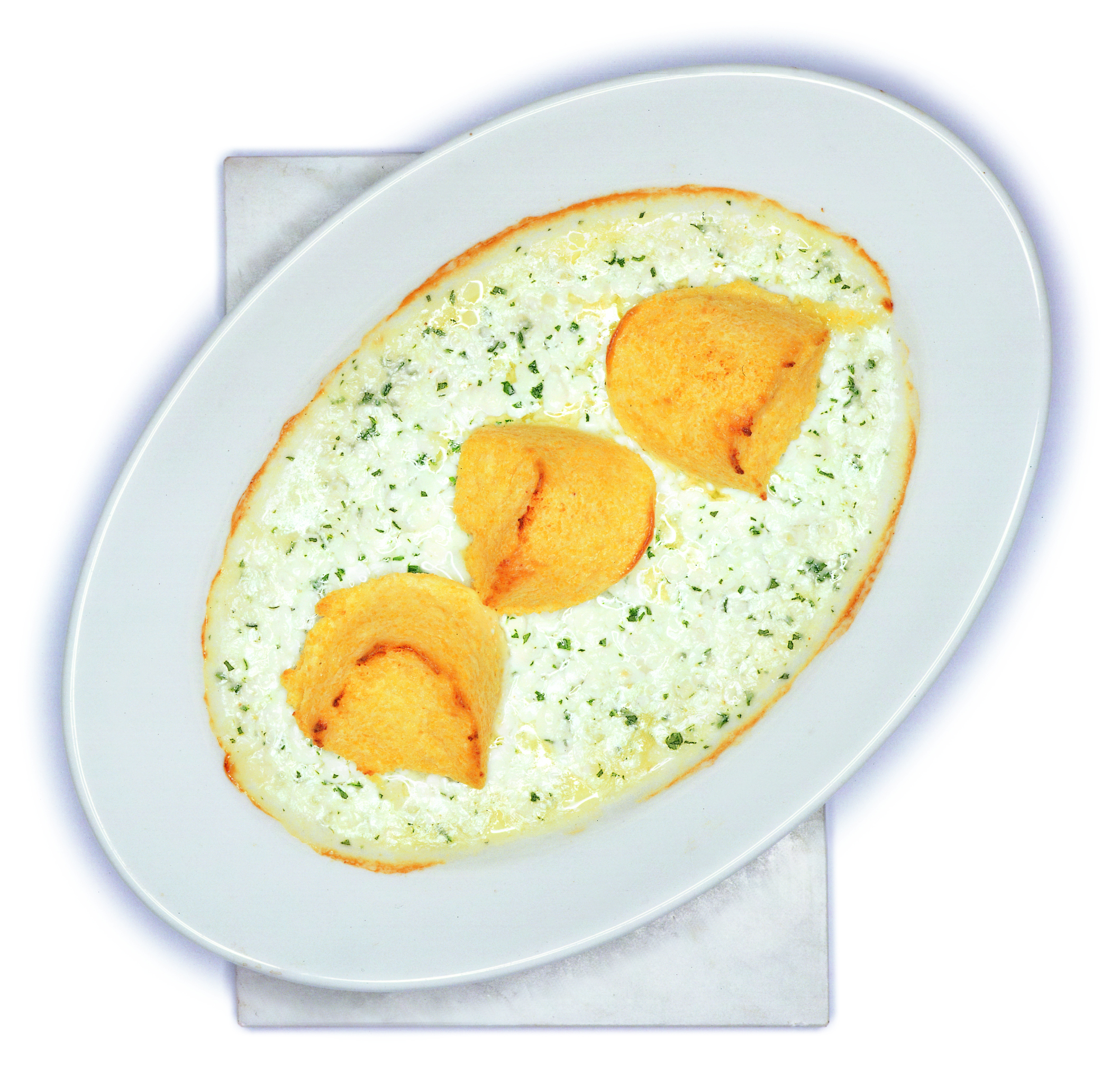 Noques de maïs et fromage frais granulé à la roquette