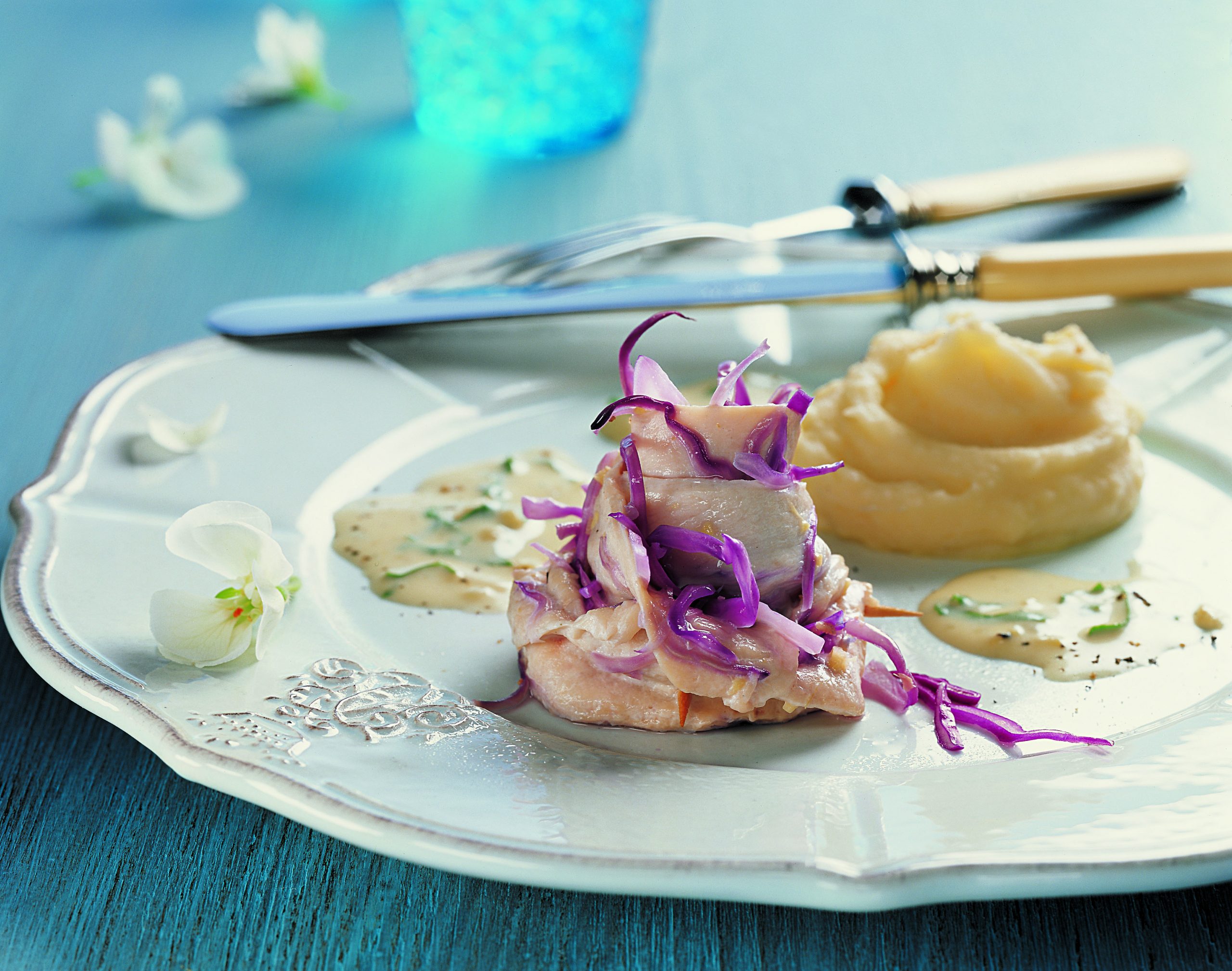 Poulet-Blumen mit Kartoffelstock