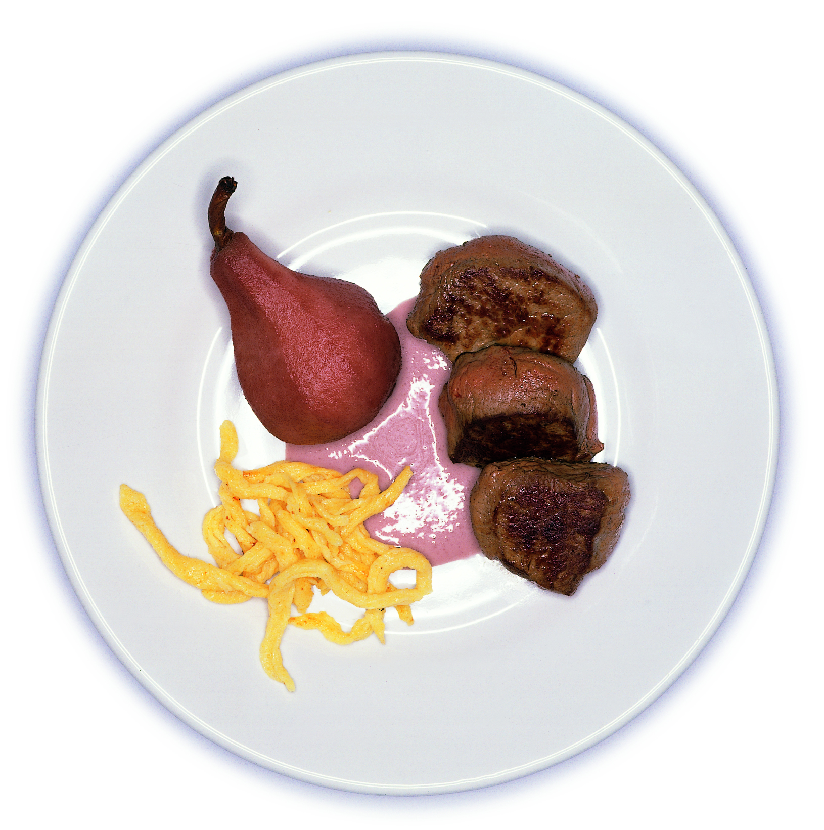 Rehmedaillons an Portweinbirnensauce