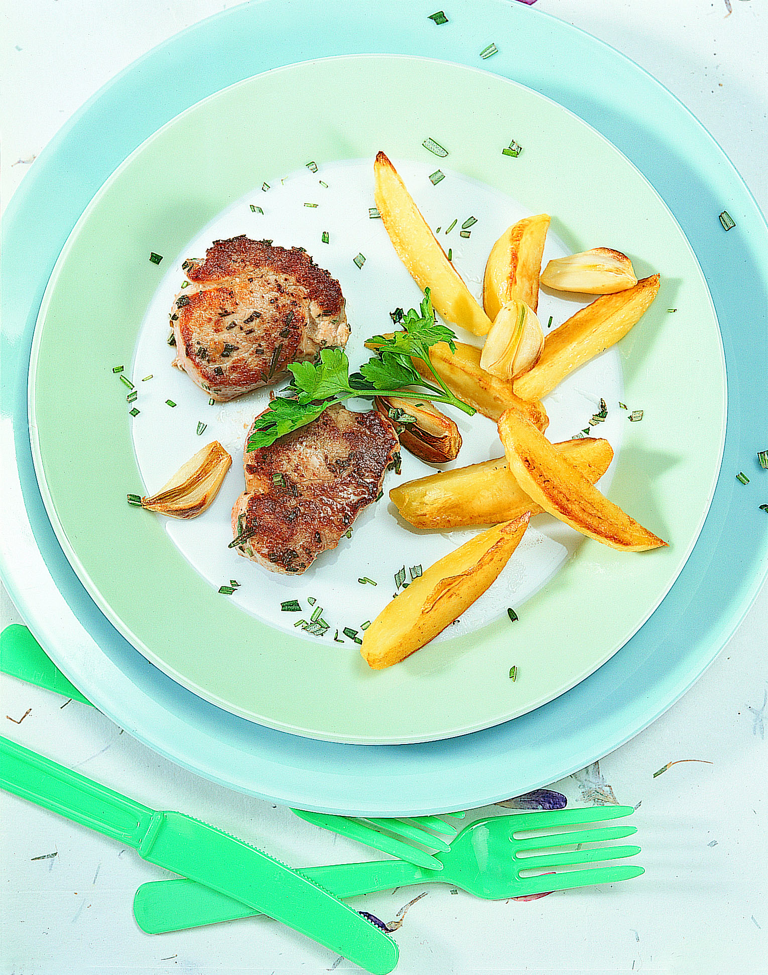 Filet mignon de porc et pommes de terre à l'ail